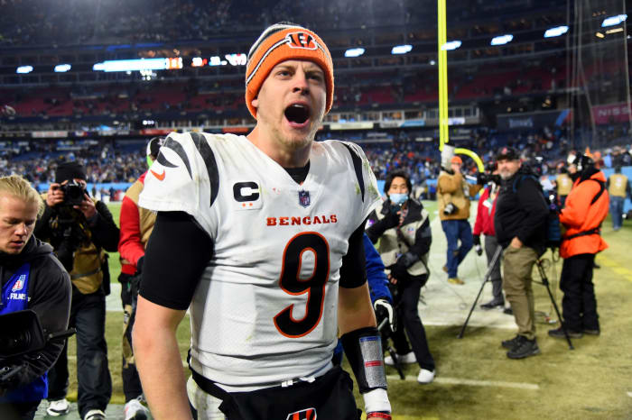 Jan 22, 2022; Nashville, Tennessee, USA; Cincinnati Bengals quarterback Joe Burrow (9) celebrates after the Bengals defeated the Tennessee Titans 19-16 in the AFC Divisional playoff football game at Nissan Stadium. Mandatory Credit: Christopher Hanewinckel-USA TODAY Sports